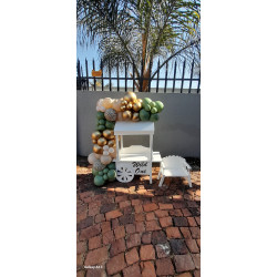 Garland on Small Candy Cart with small chair. ( candy cart meaures 1.5heightx80cm)